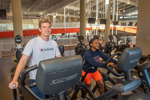 Two Auburn students working out