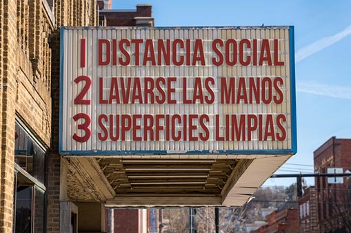 Sign with Hispanic words displayed