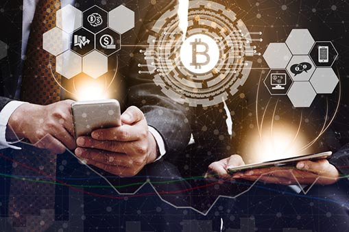 Bitcoin graphic and a hand holding a phone