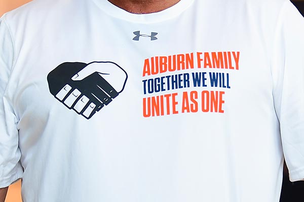 T-shirt that says Auburn Family, Together We Will Unite as One