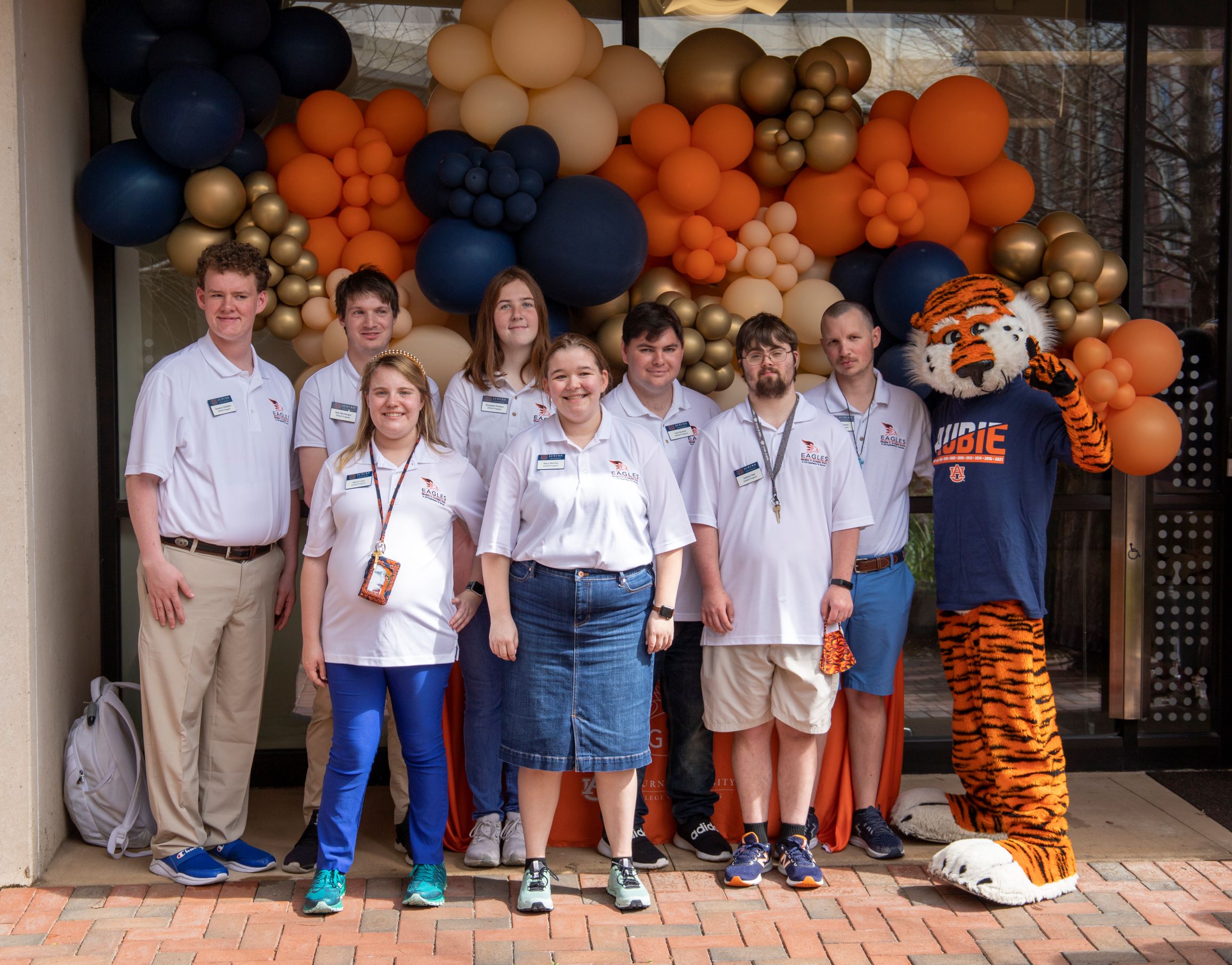 A group of EAGLES students with Aubie.