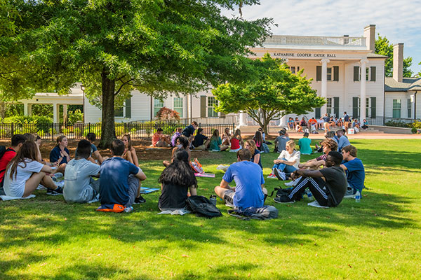 Students sitting outdoors