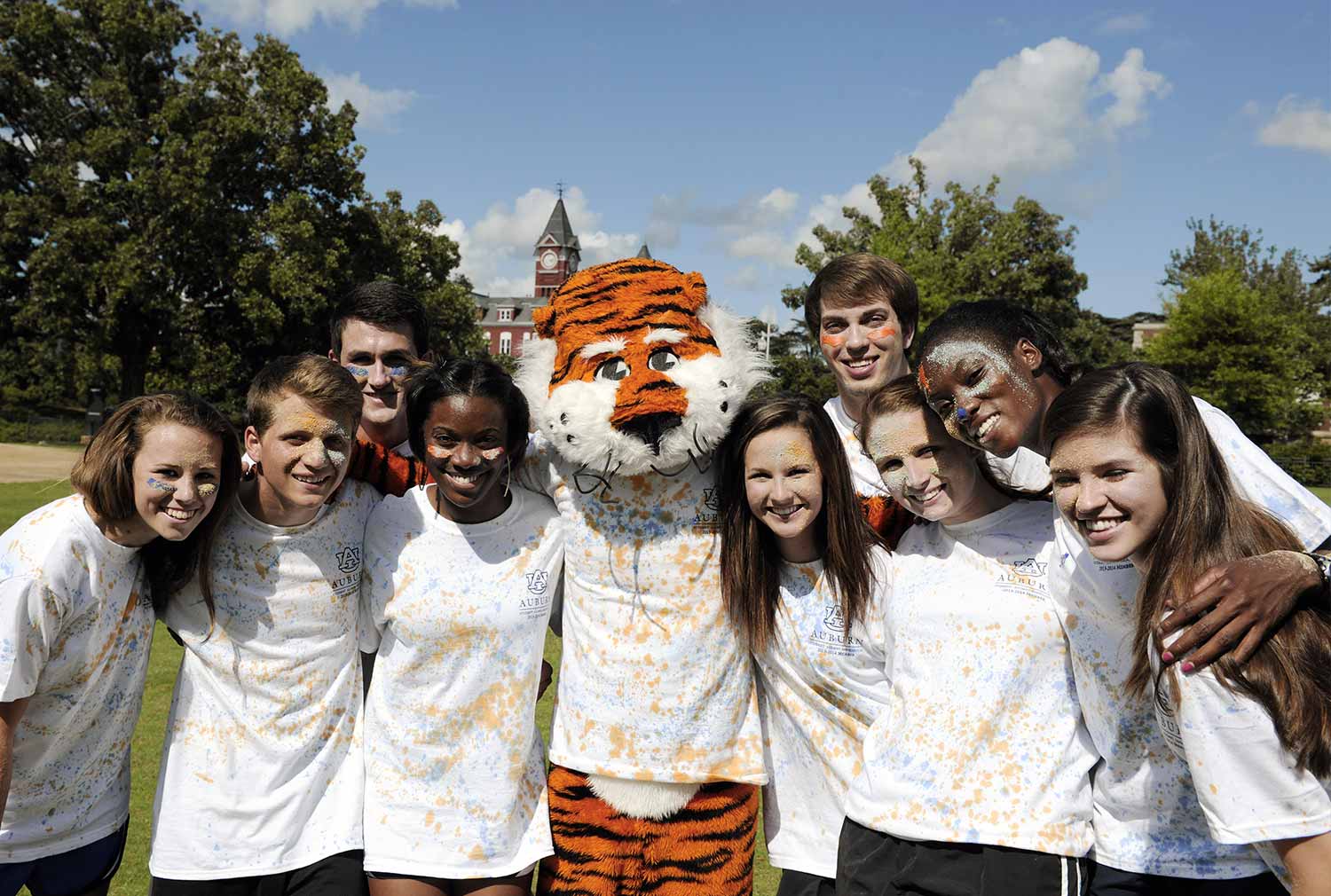 Several Students standing next to Aubie