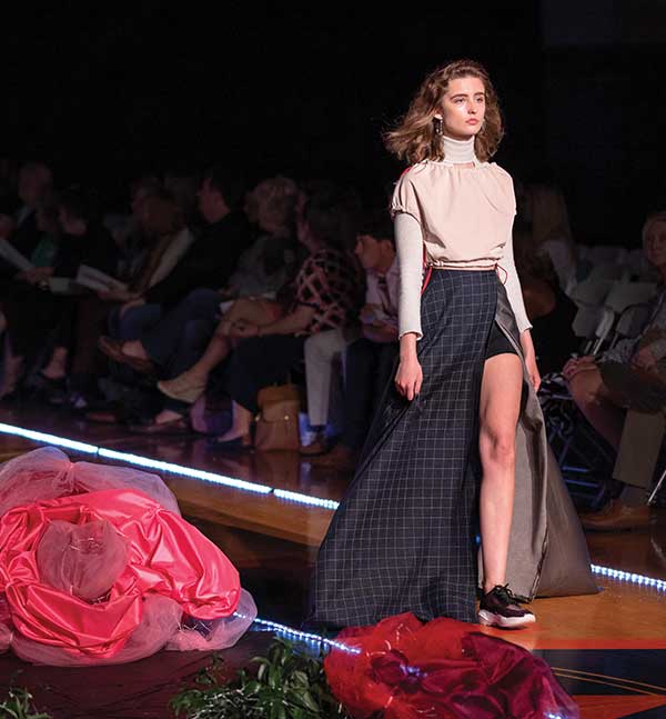 A model walks the runway at a fashion show