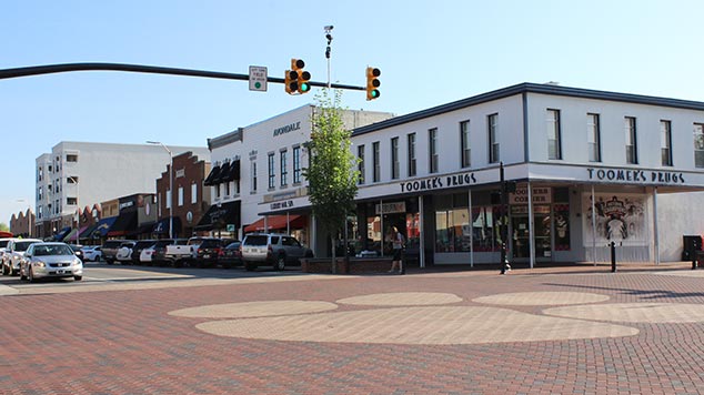 An photograph of Toomers Corner taken from the corner of Auburn's campus.